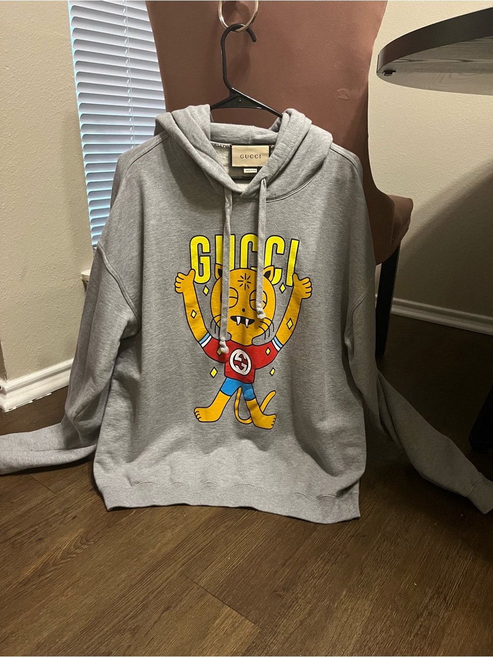 Gucci Gray Hoodie with Yellow Cartoon Logo